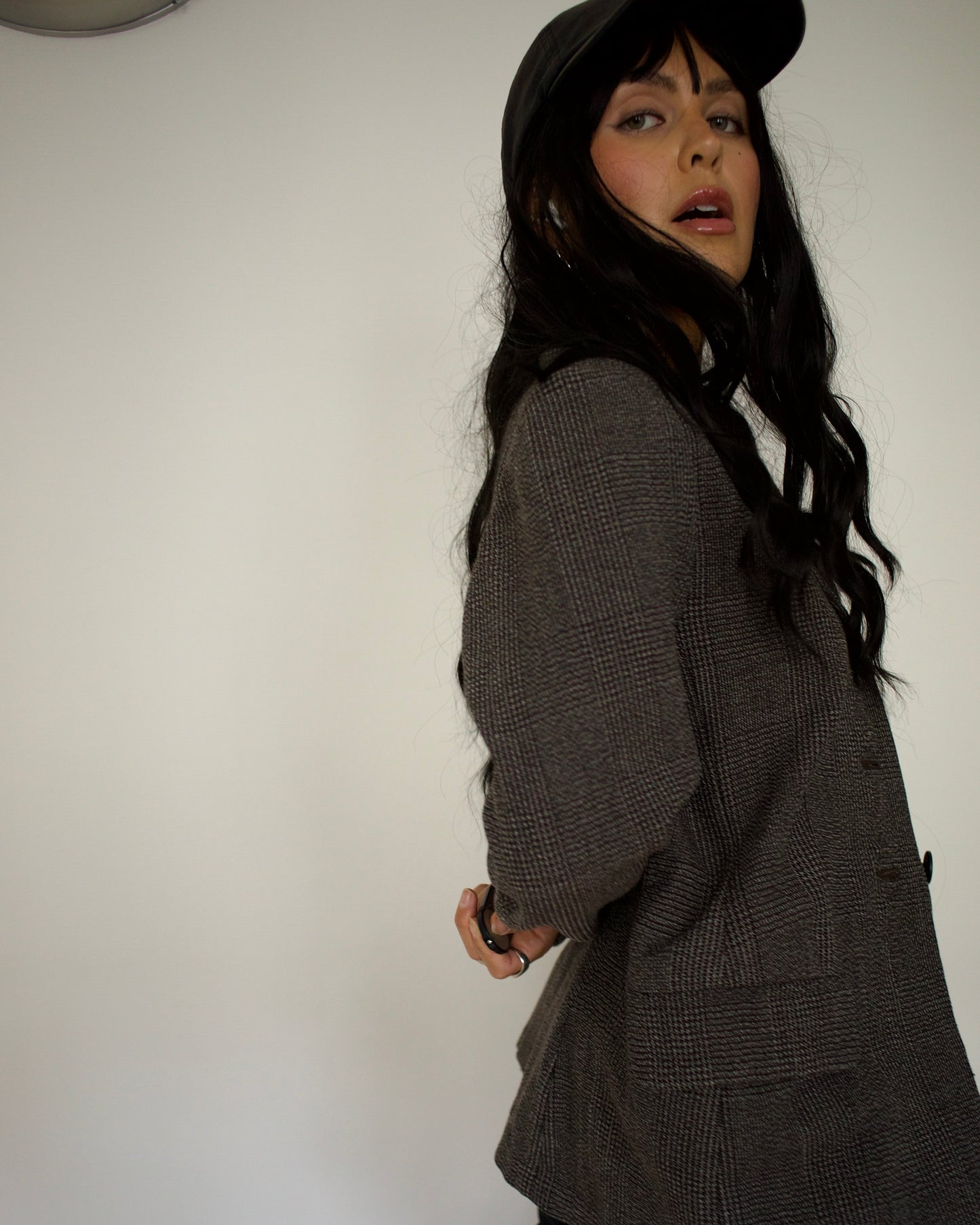 Side profile of model in vintage Sportmax tailored jacket