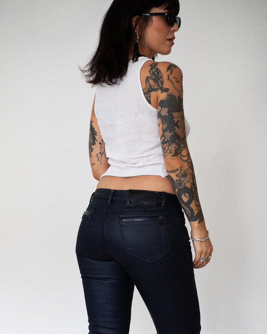 Model wearing early 2000s Prada jeans with low-rise waist and straight leg fit