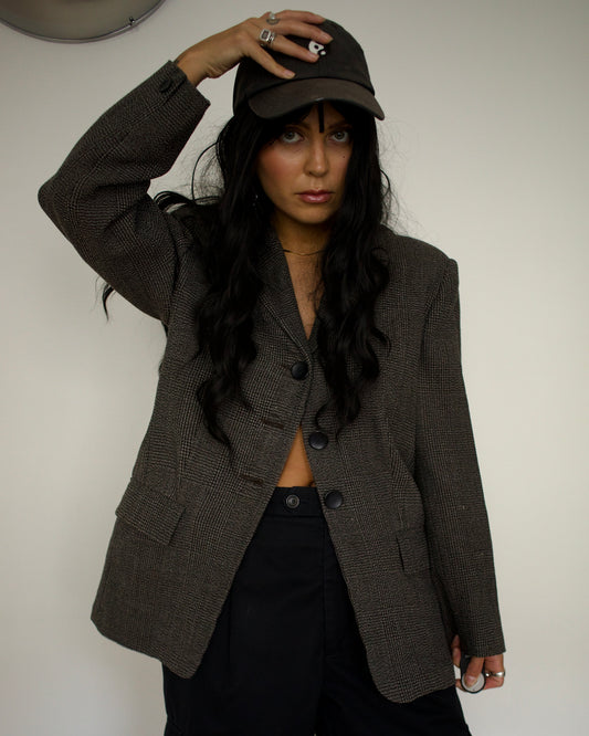 Model wearing vintage Sportmax grey checked jacket, front view
