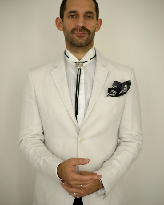 Model wearing white 1990s Emporio Armani Blue Line linen blazer with tailored fit and chest pocket, size S