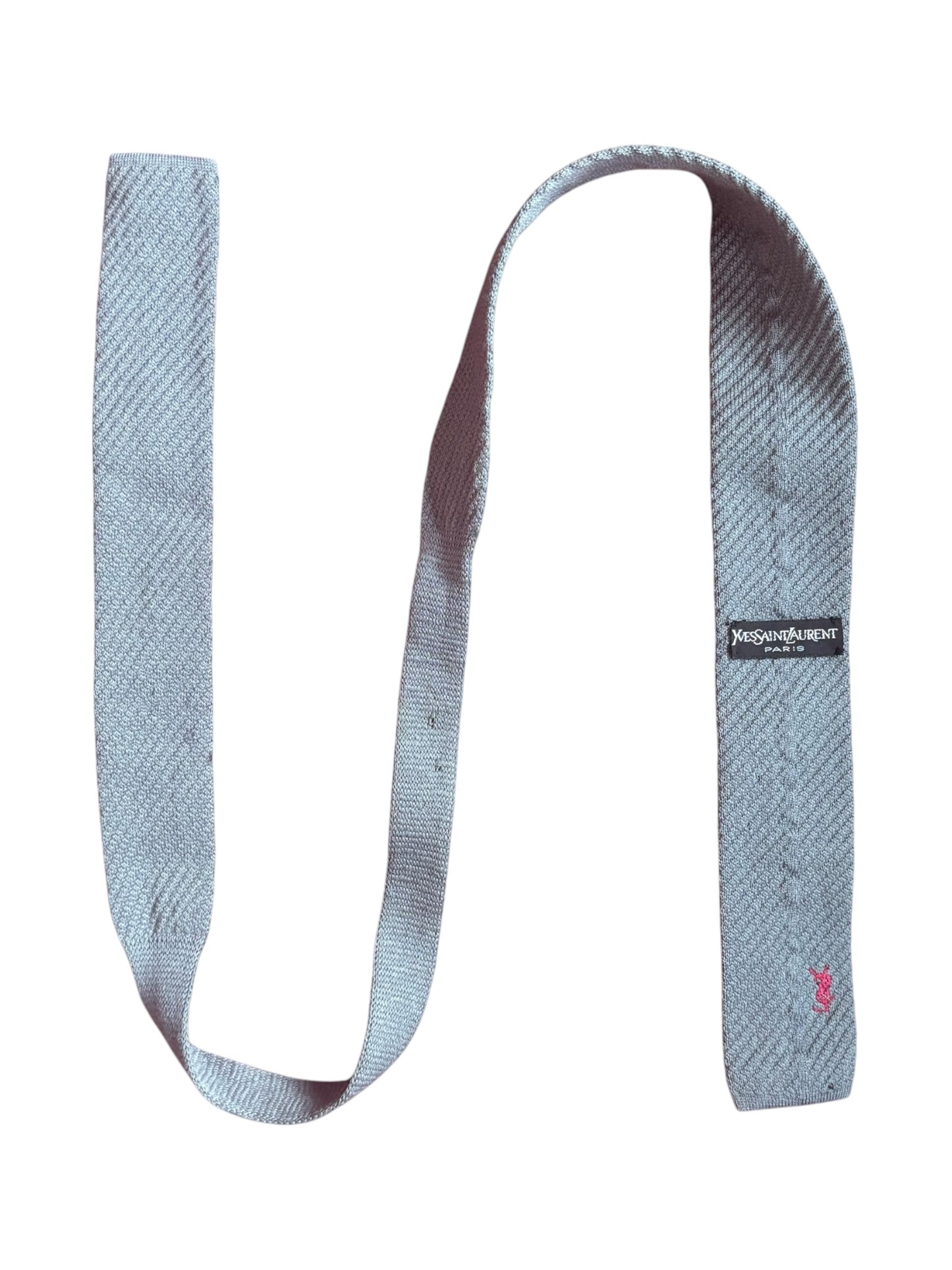 Full view of the grey square tip tie laid flat