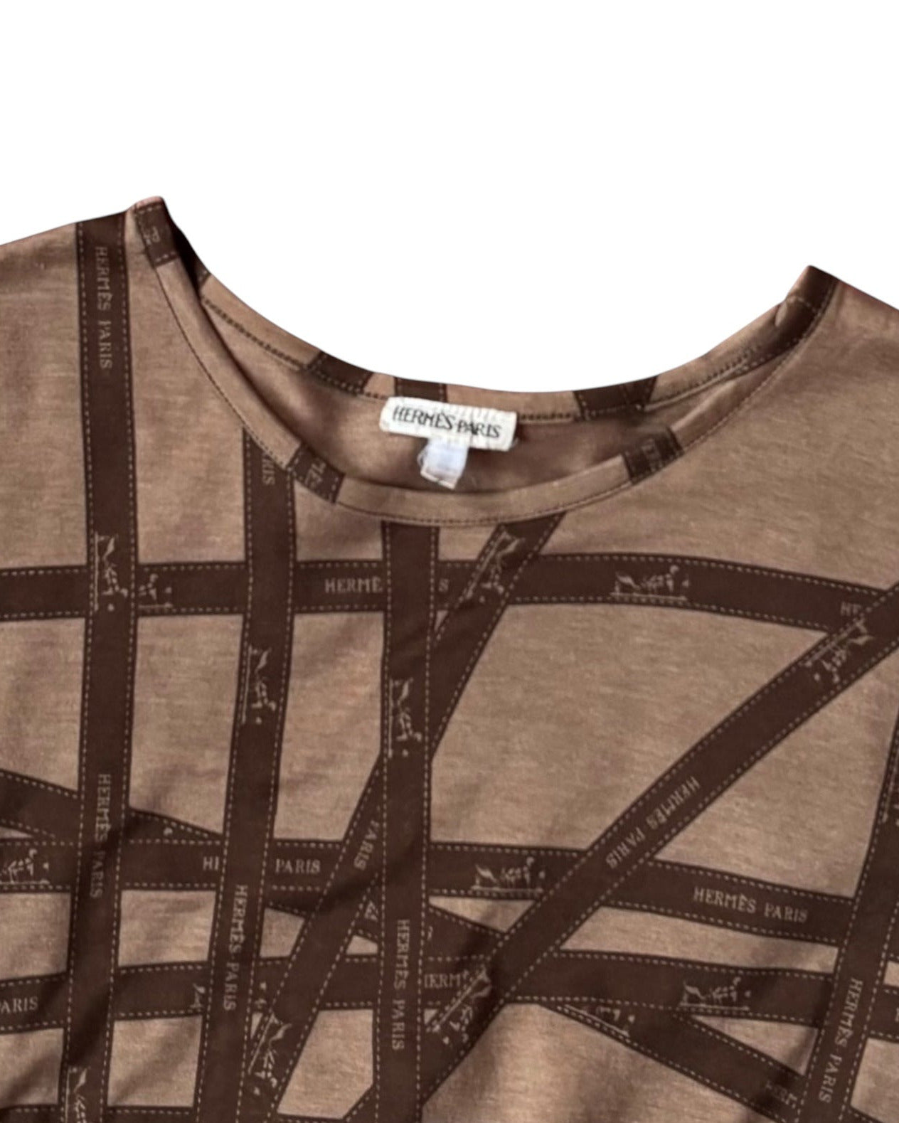 Close-up of Hermès Bolduc logo ribbon print on vintage brown T-shirt