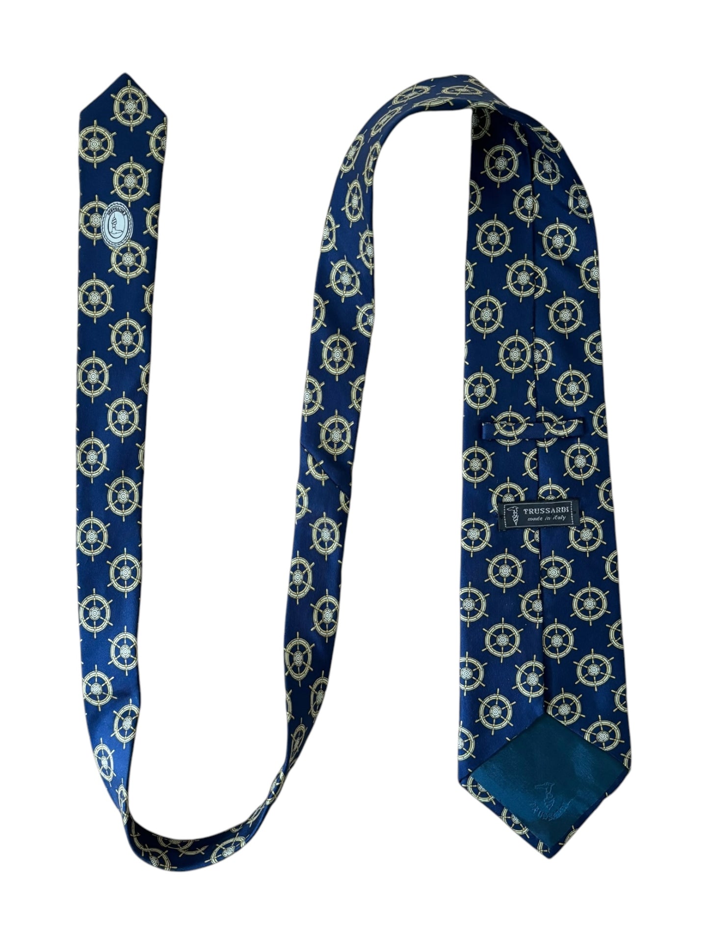 Front view of vintage Trussardi silk necktie with nautical ship’s wheel pattern.