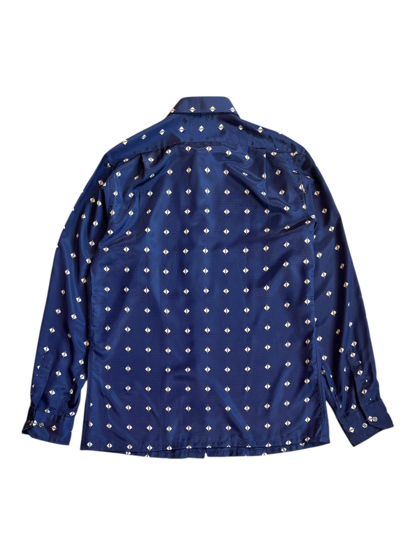 Back view of glossy navy 1970s Givenchy shirt with white motif