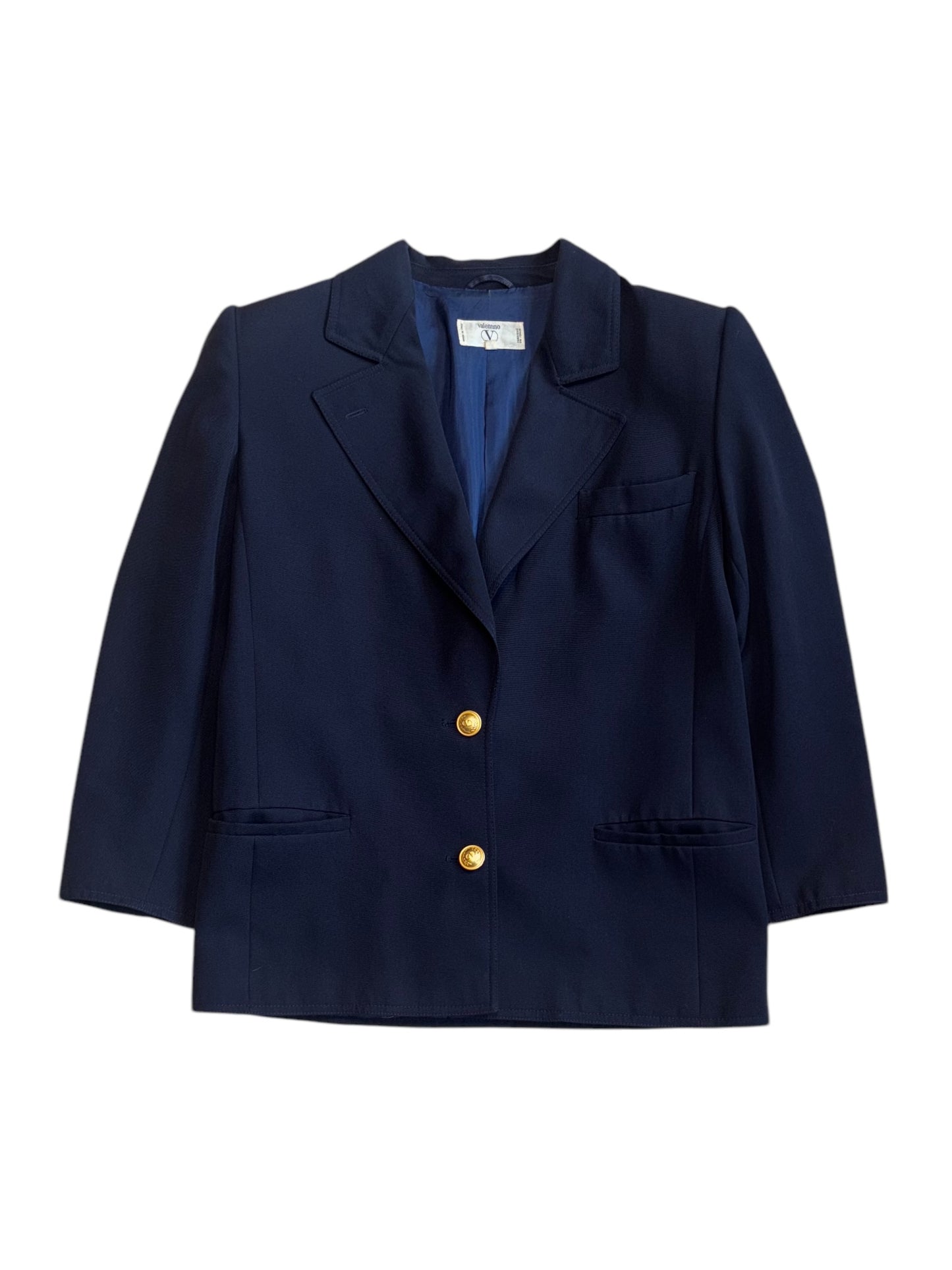 A navy blue Valentino blazer with gold button detailing and padded shoulders, displayed against a plain background.