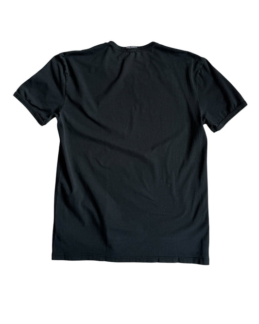 Back of Dolce & Gabbana stretch black T-shirt showing tight silhouette