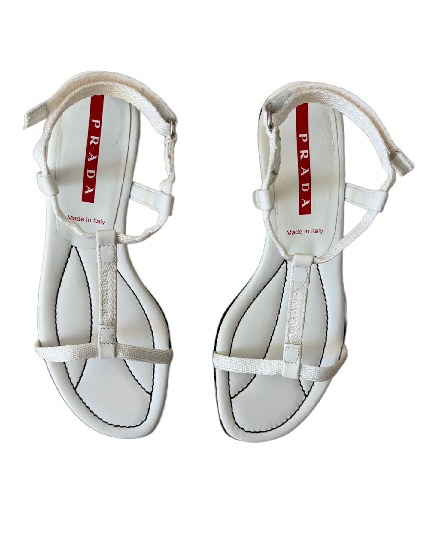 Vintage Prada Linea Rossa white strappy kitten heel sandals with red tab logo, size 37.5, shown against white background.
