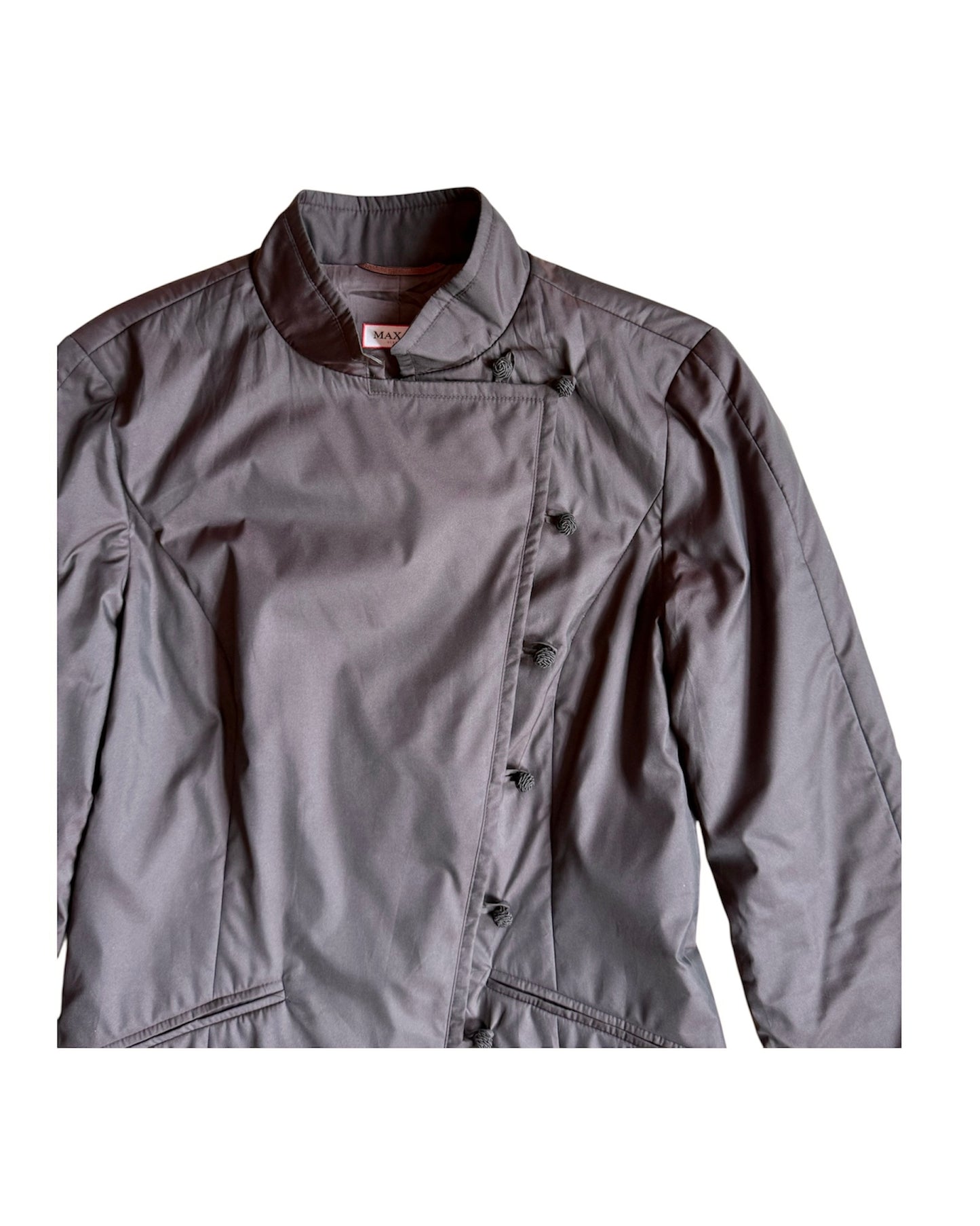 Side angle showing tailored silhouette and collar detail