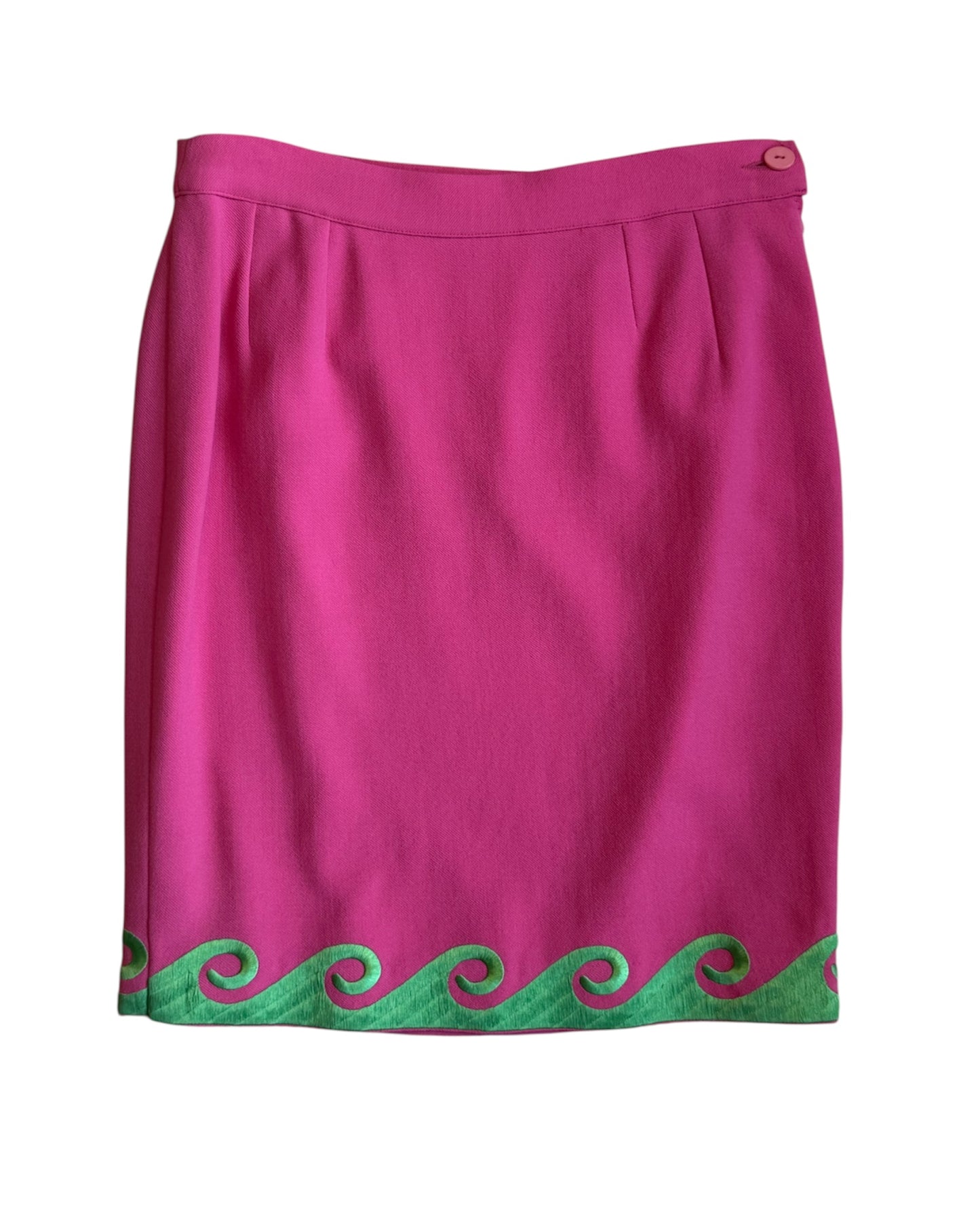 Front view of the pink Roccobarocco skirt with green wave trim