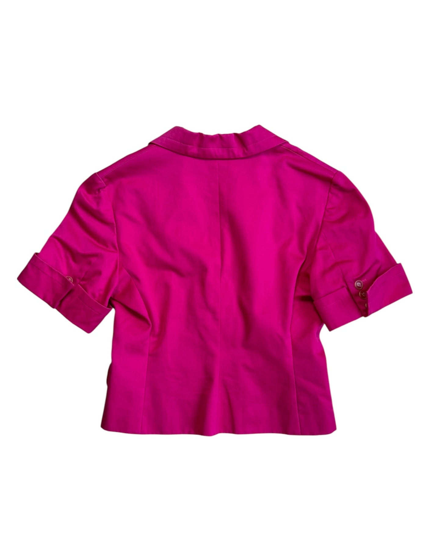 Back view of a bright pink YSL blazer on a white background