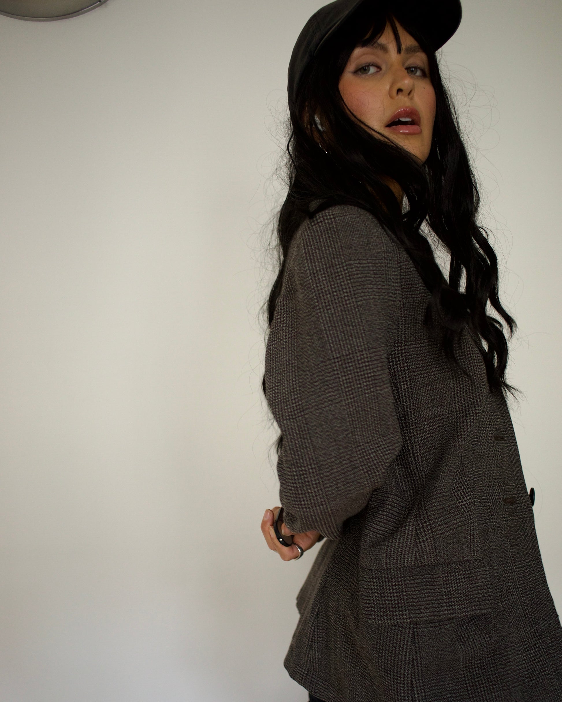 Side profile of model in vintage Sportmax tailored jacket