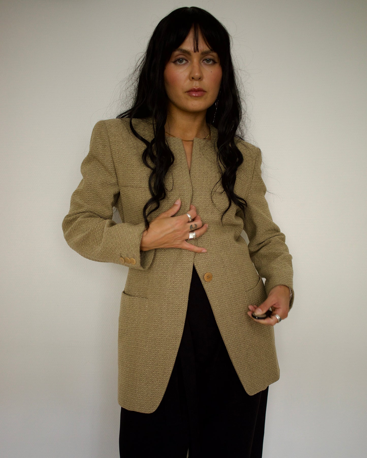 Model styling vintage Emporio Armani beige cashmere wool collarless blazer with black outfit