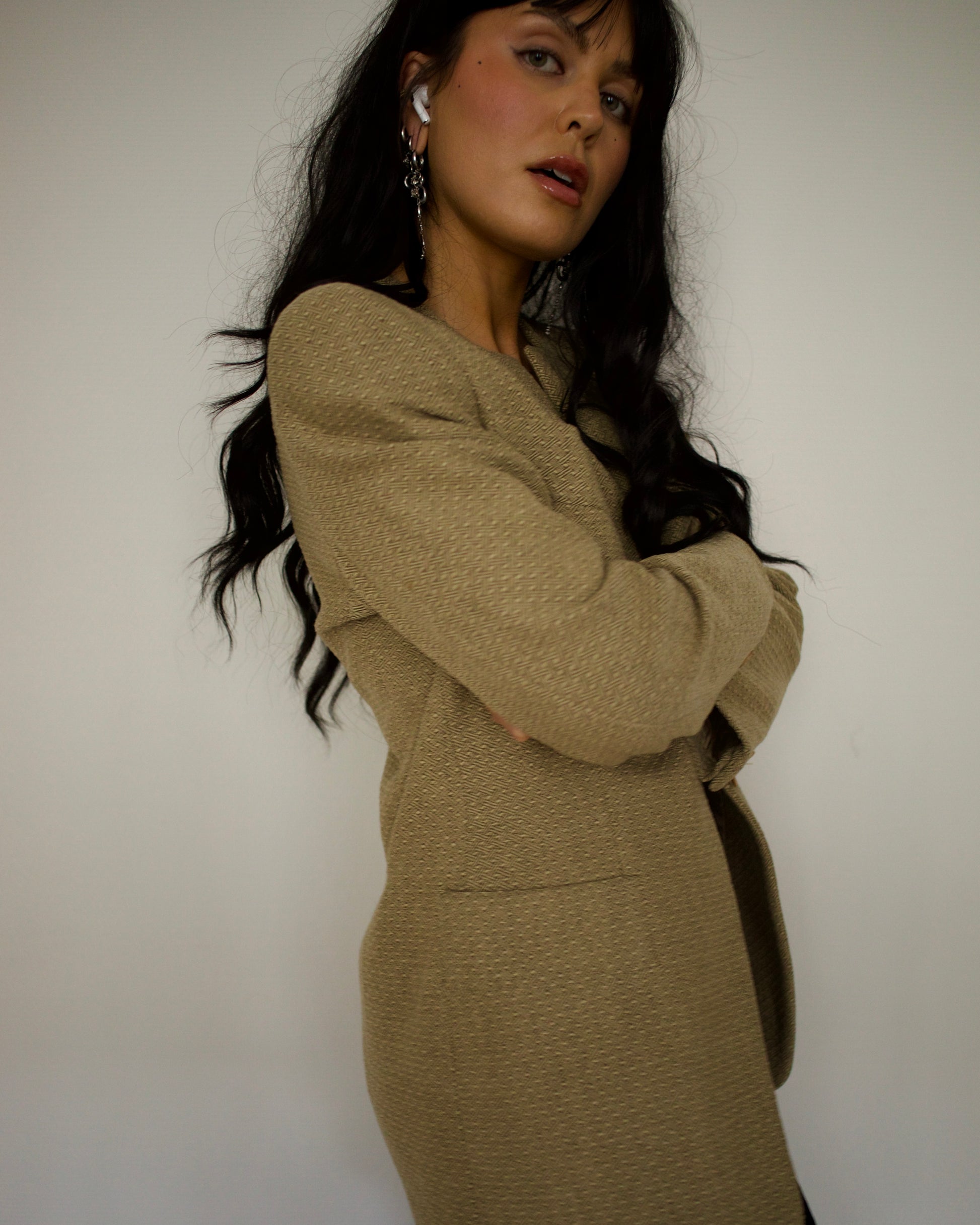 Model wearing vintage Emporio Armani beige cashmere wool collarless blazer side profile