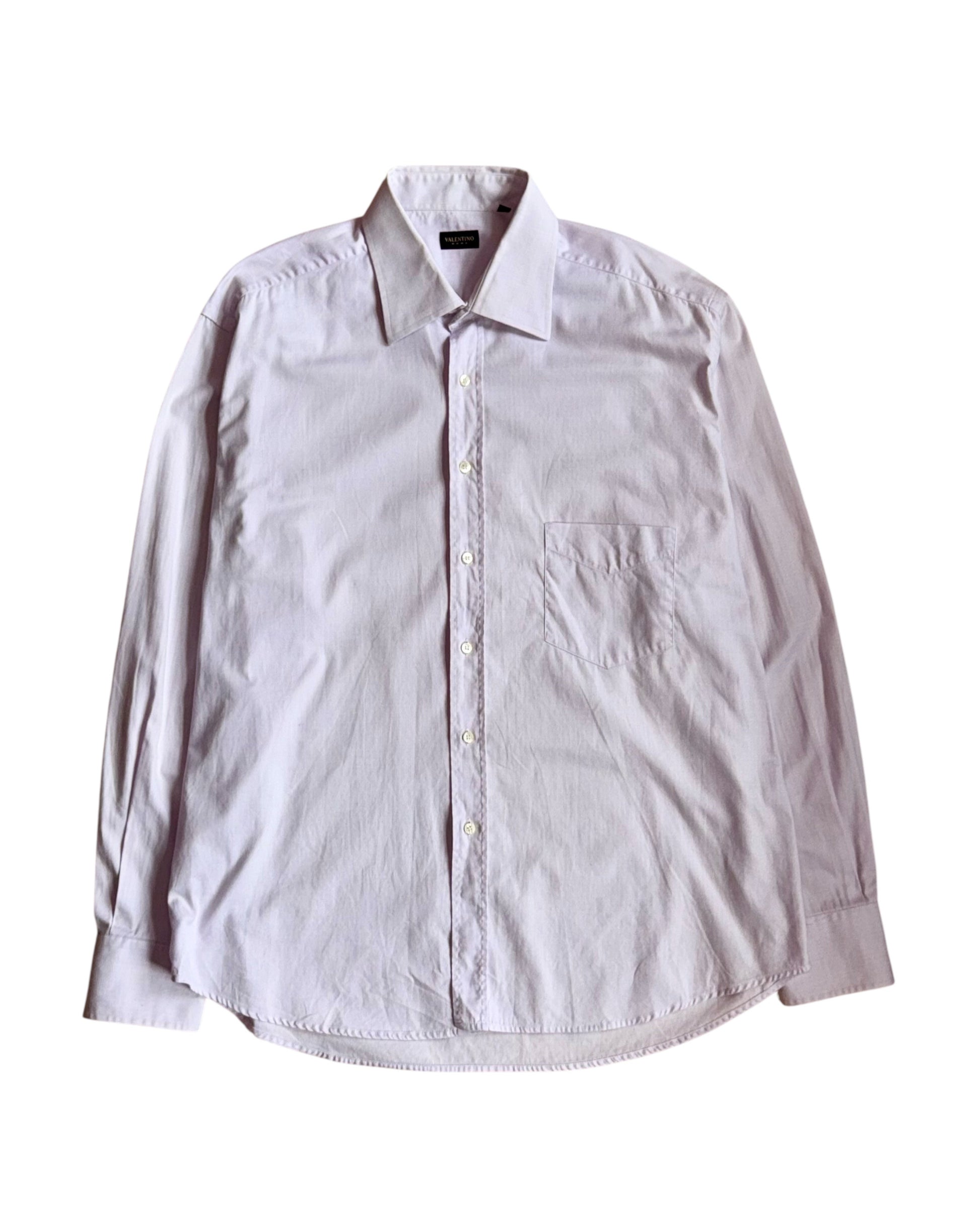 Light pink button-up shirt on a white background