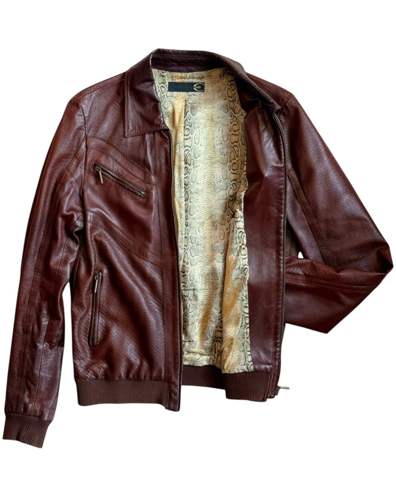 Brown ss 2007 Just Cavalli leather jacket with fur lining on a white background
