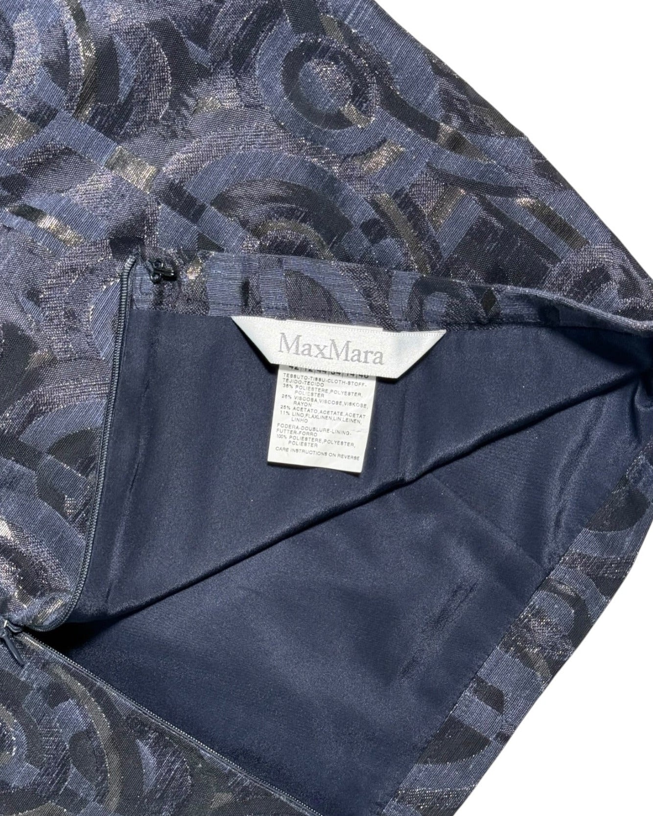 Navy blue fabric with a pattern and Max Mara label