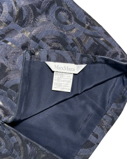 Navy blue fabric with a pattern and Max Mara label