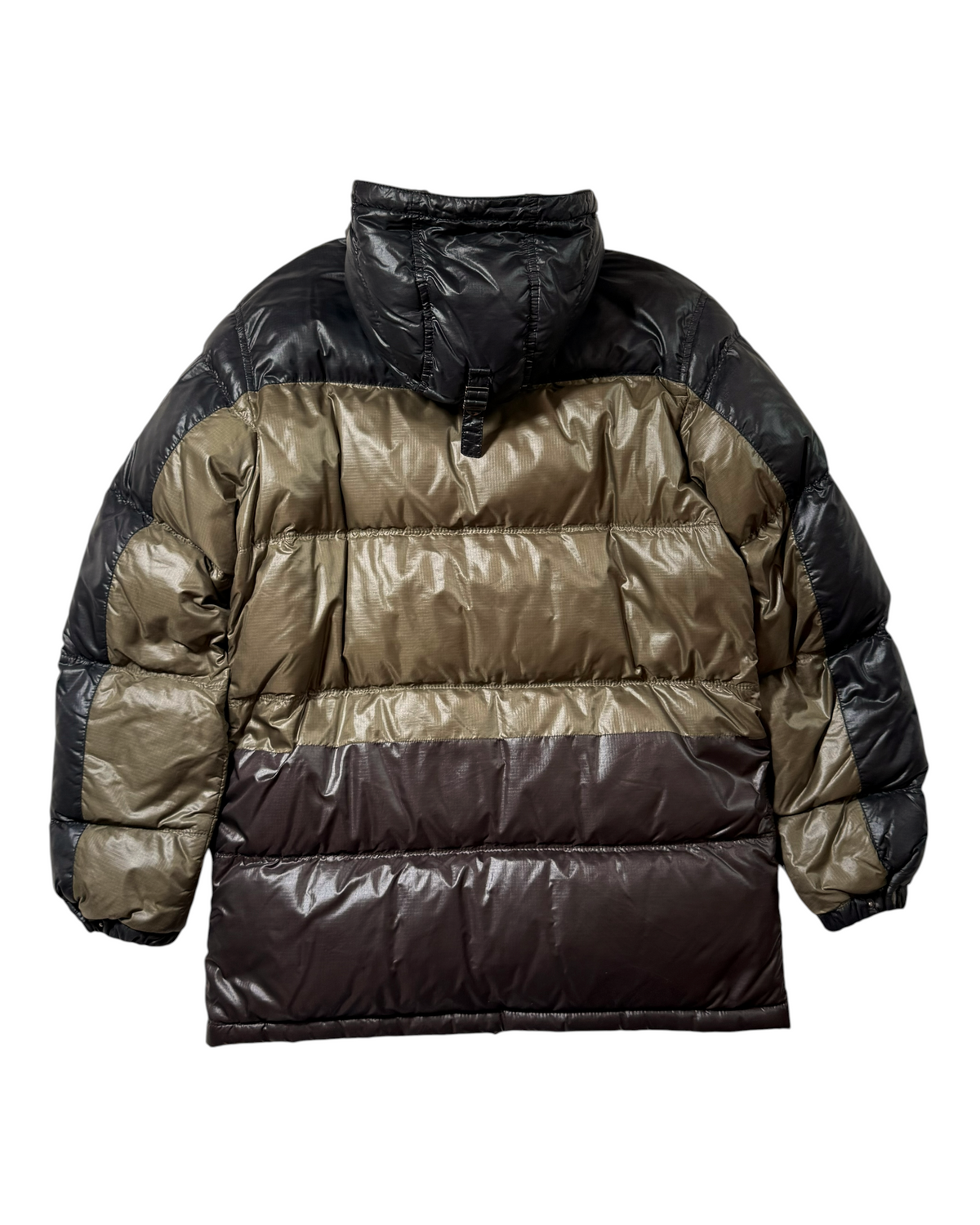 A Prada puffer jacket with a color-blocked design featuring horizontal stripes of black, olive green, and dark brown, shown from the back on a white background.
