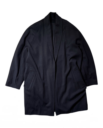 A MaxMara navy shawl collar kimono-style jacket with three-quarter sleeves and ribbed welt pockets, laid flat against a white background.