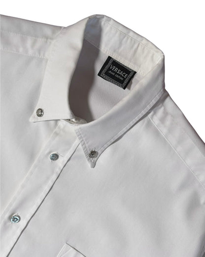 White shirt with Versace label on a white background