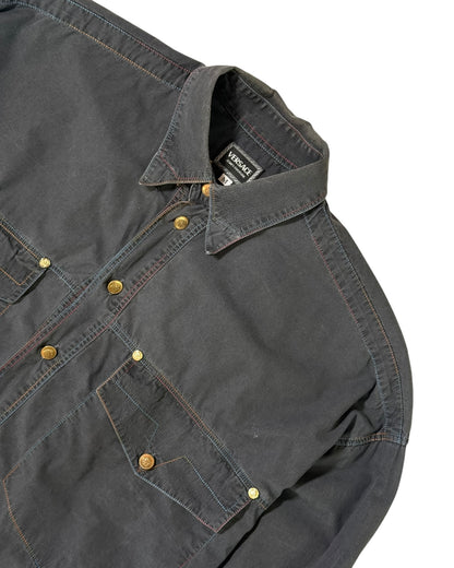 Dark gray versace shirt with button details on a white background