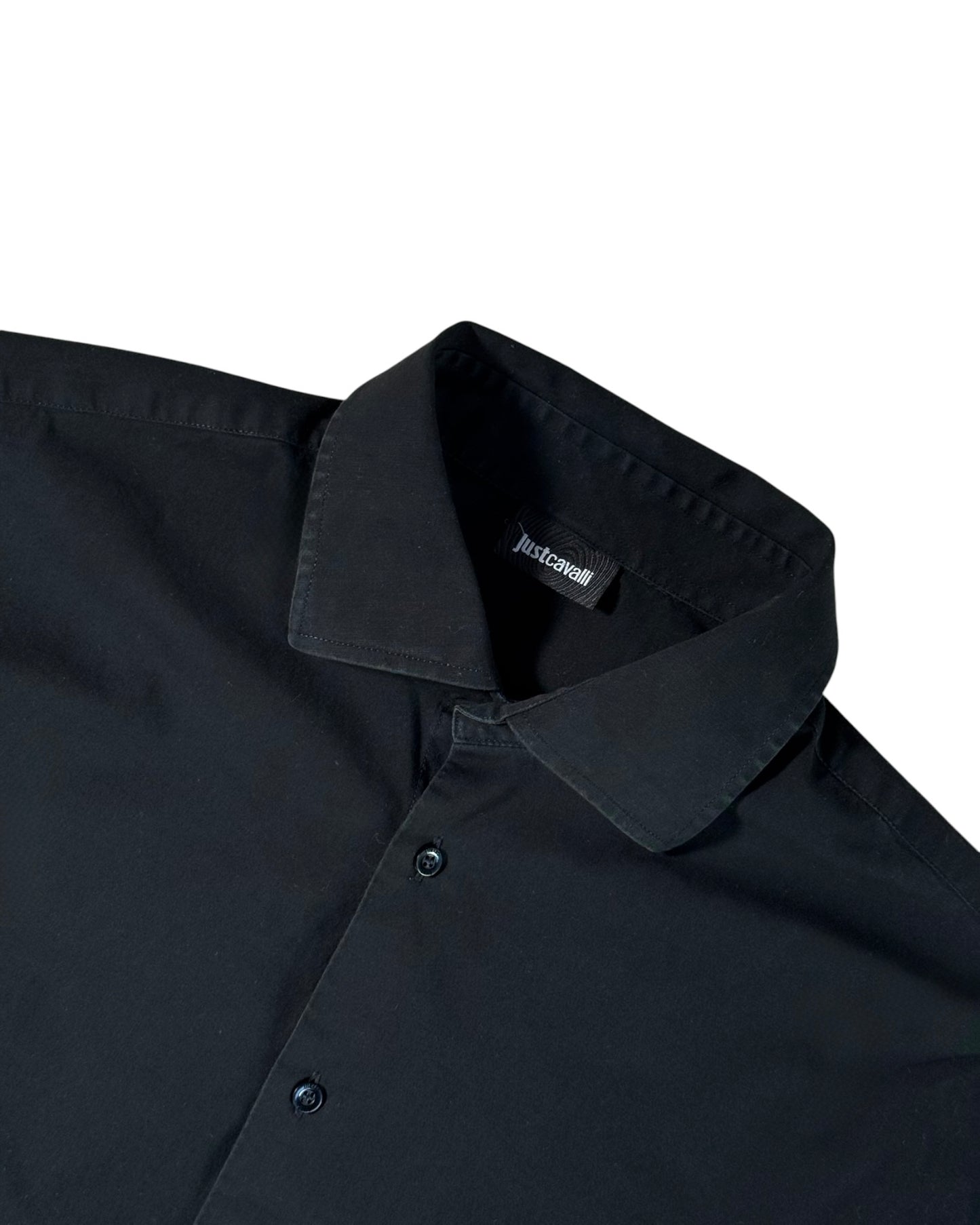 Black shirt collar with a brand label on a white background