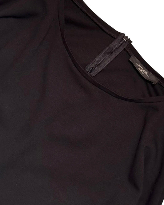 Close-up of a Max Mara dress with a zipper detail on a white background