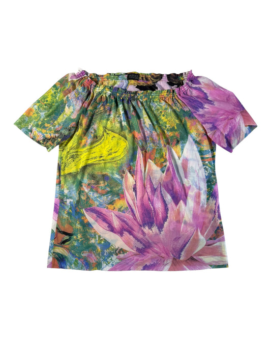 Colorful Versace floral blouse with a white background