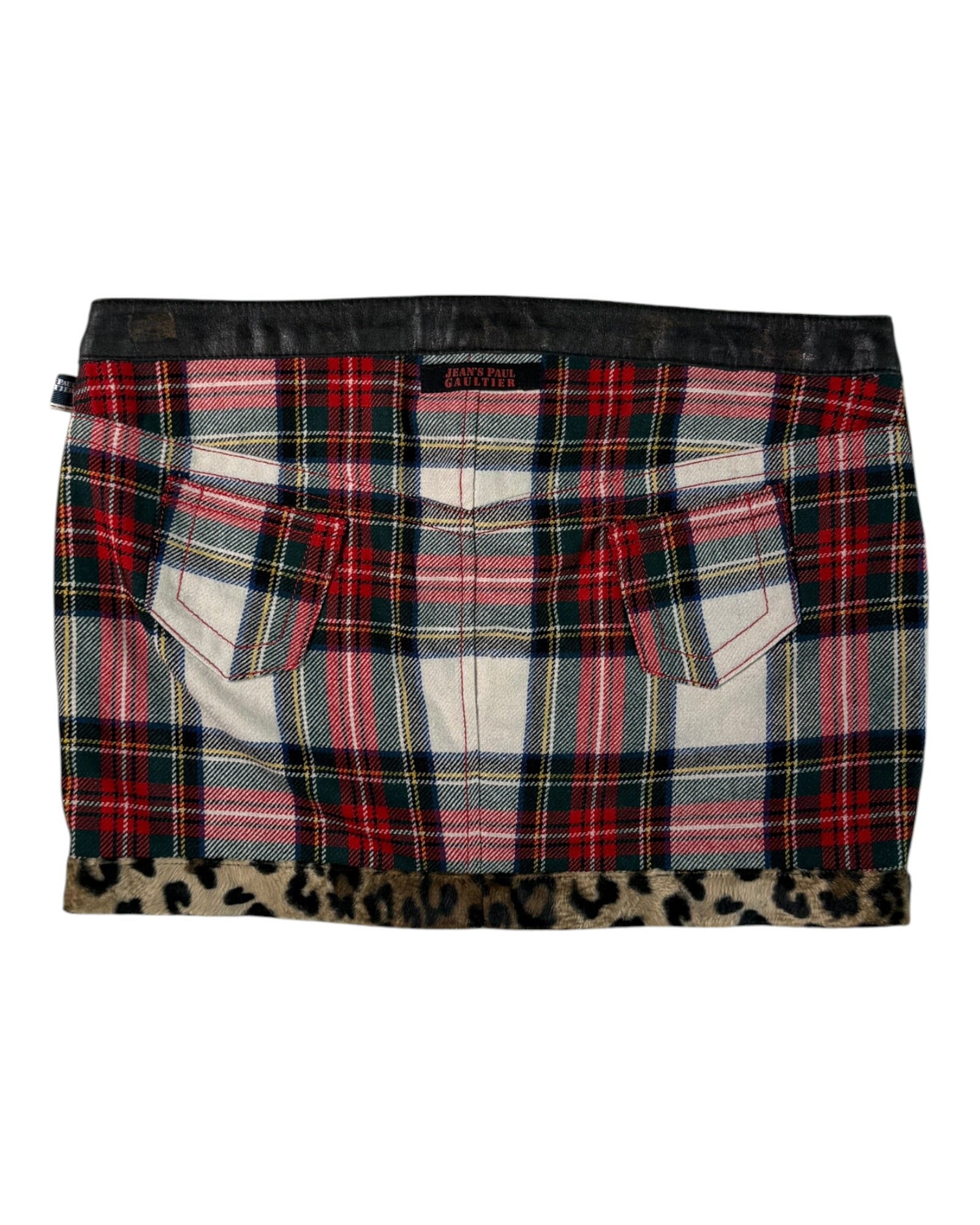 Jean Paul Gaultier laid skirt with leopard print hem on a white background