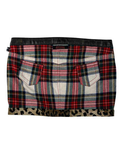 Jean Paul Gaultier laid skirt with leopard print hem on a white background