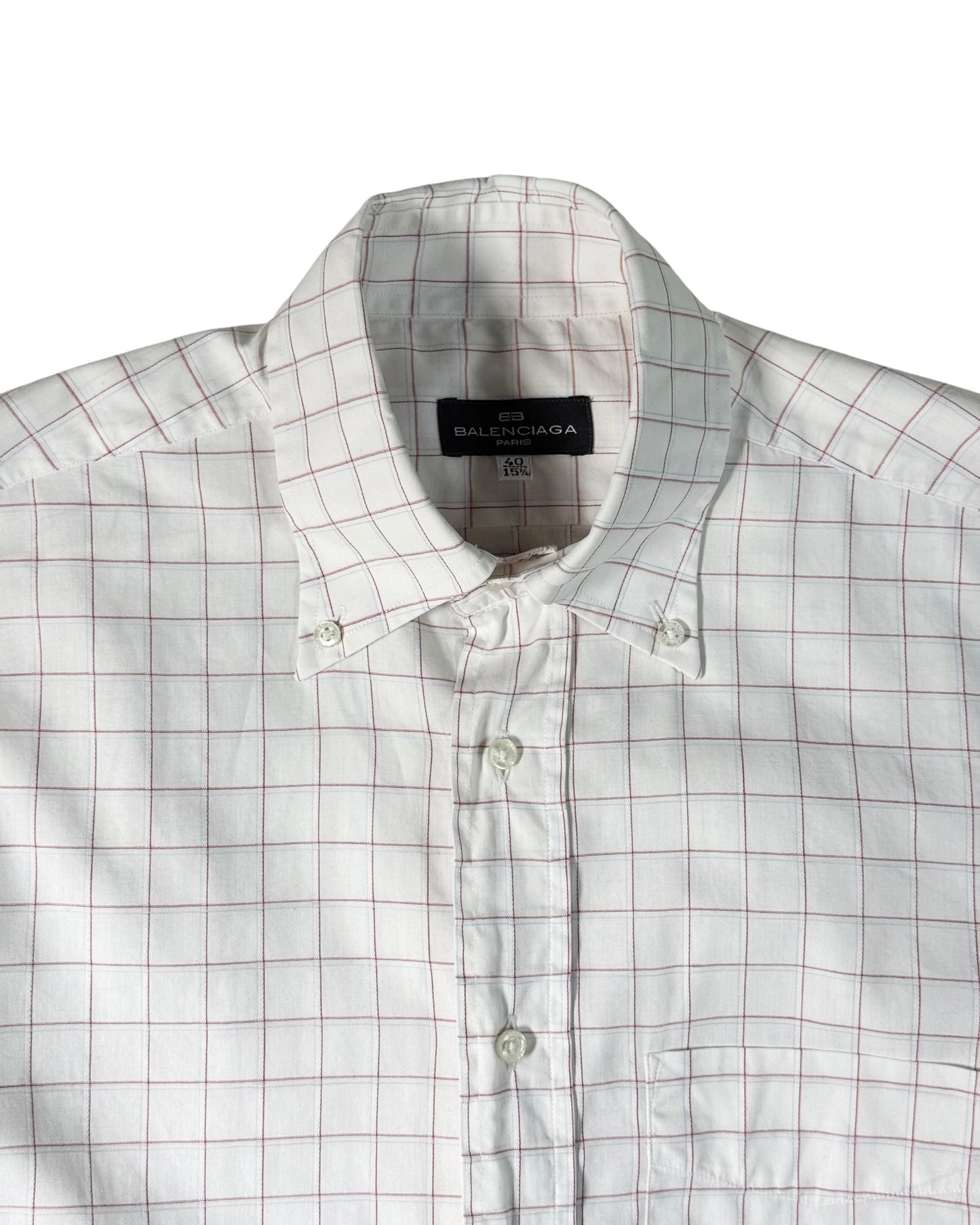 White checkered shirt with balenciaga label on a white background