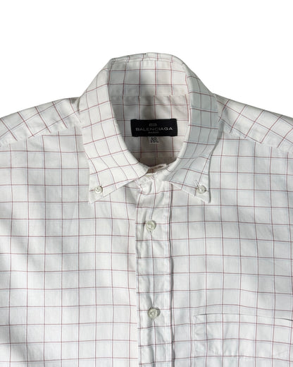 White checkered shirt with balenciaga label on a white background