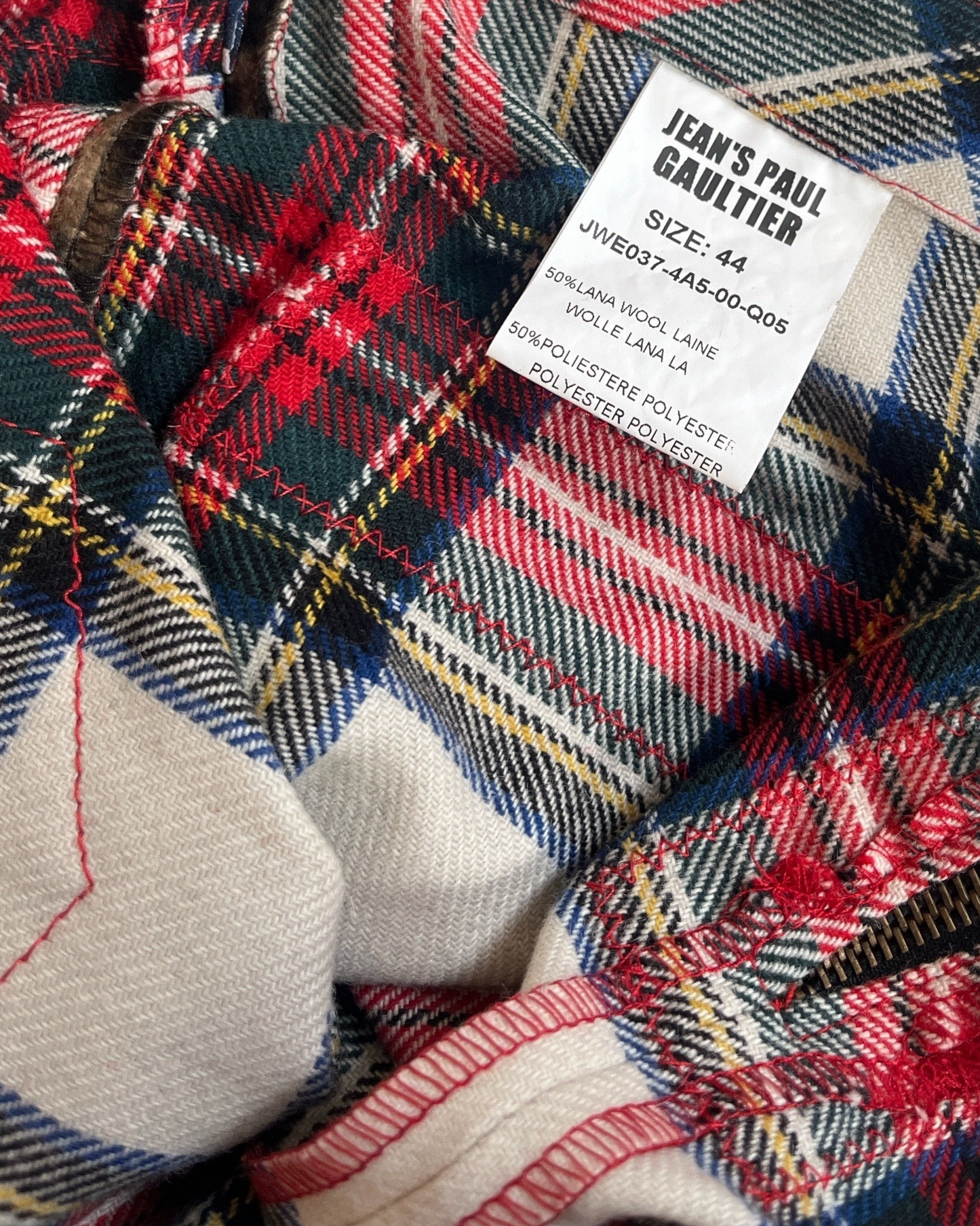 Plaid fabric with a label on a close-up of clothing