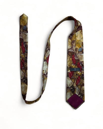 Ermenegildo Zegna vintage silk necktie with abstract gold, burgundy, and earthy pattern on a textured background.