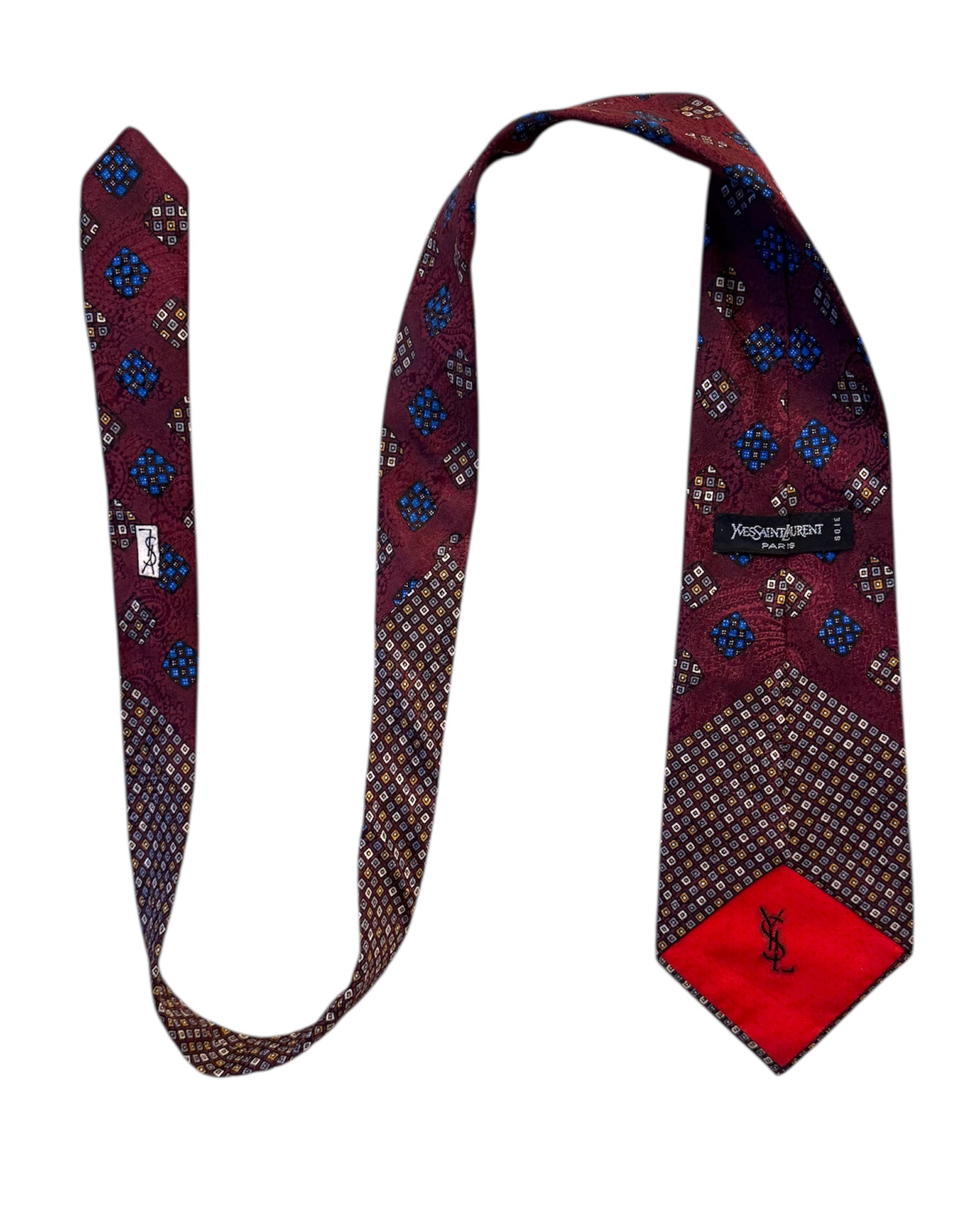 Patterned tie with a red end on a white background