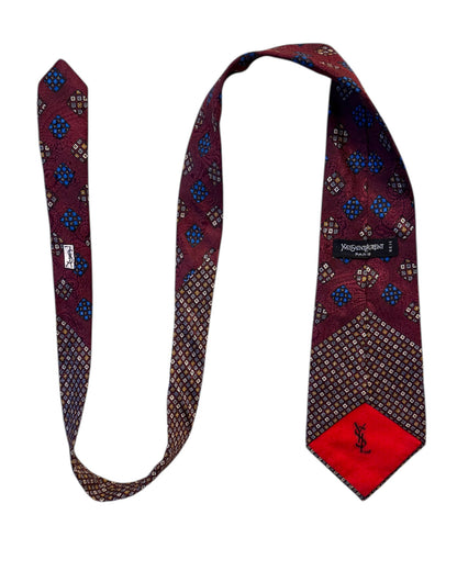 Patterned tie with a red end on a white background