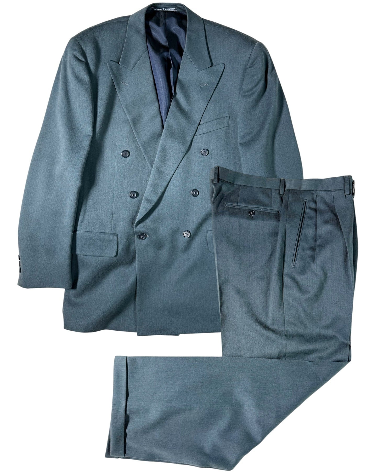 Gray suit jacket and pants on a white background