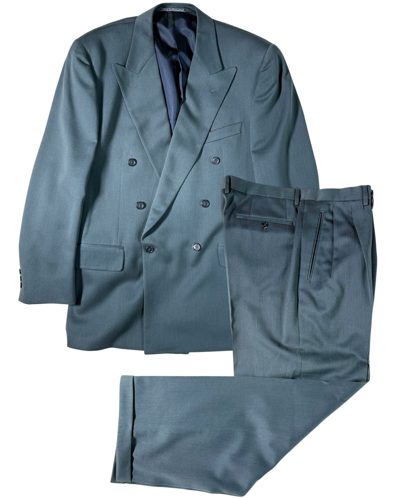 Gray suit jacket and pants on a white background