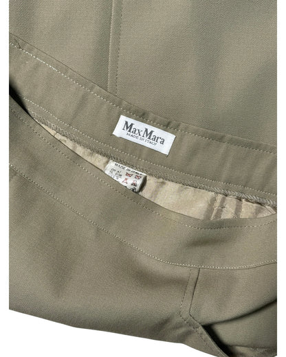 Close-up of a Max Mara label on a piece of fabric.